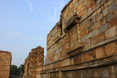 Low angle view of old building against sky