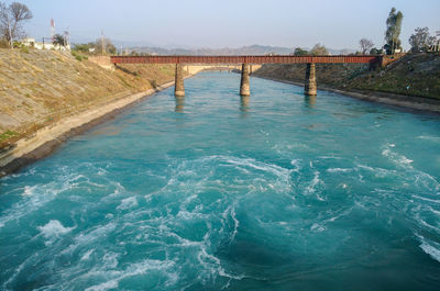 High angle view of river below bridge