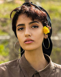 Portrait of young woman looking away