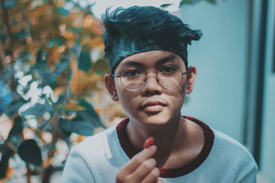 Portrait of young man looking away
