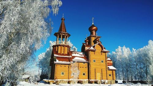 Statue of church in winter