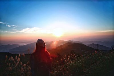 Woman looking at mountains