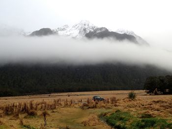 Scenic view of mountains against sky during winter