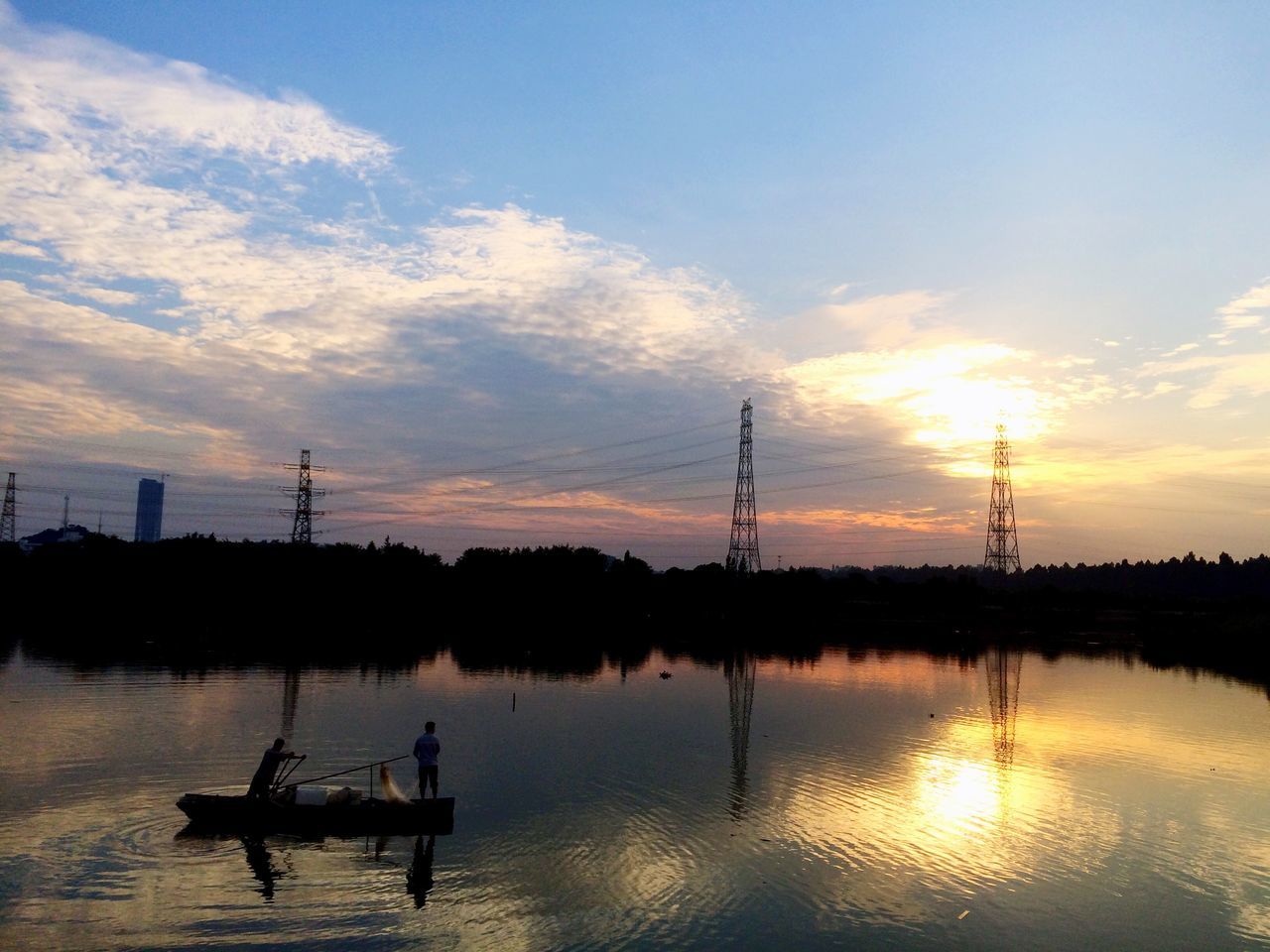 water, sunset, silhouette, tranquility, tranquil scene, sky, reflection, lake, scenics, beauty in nature, nature, nautical vessel, waterfront, transportation, cloud - sky, idyllic, boat, river, cloud, tree