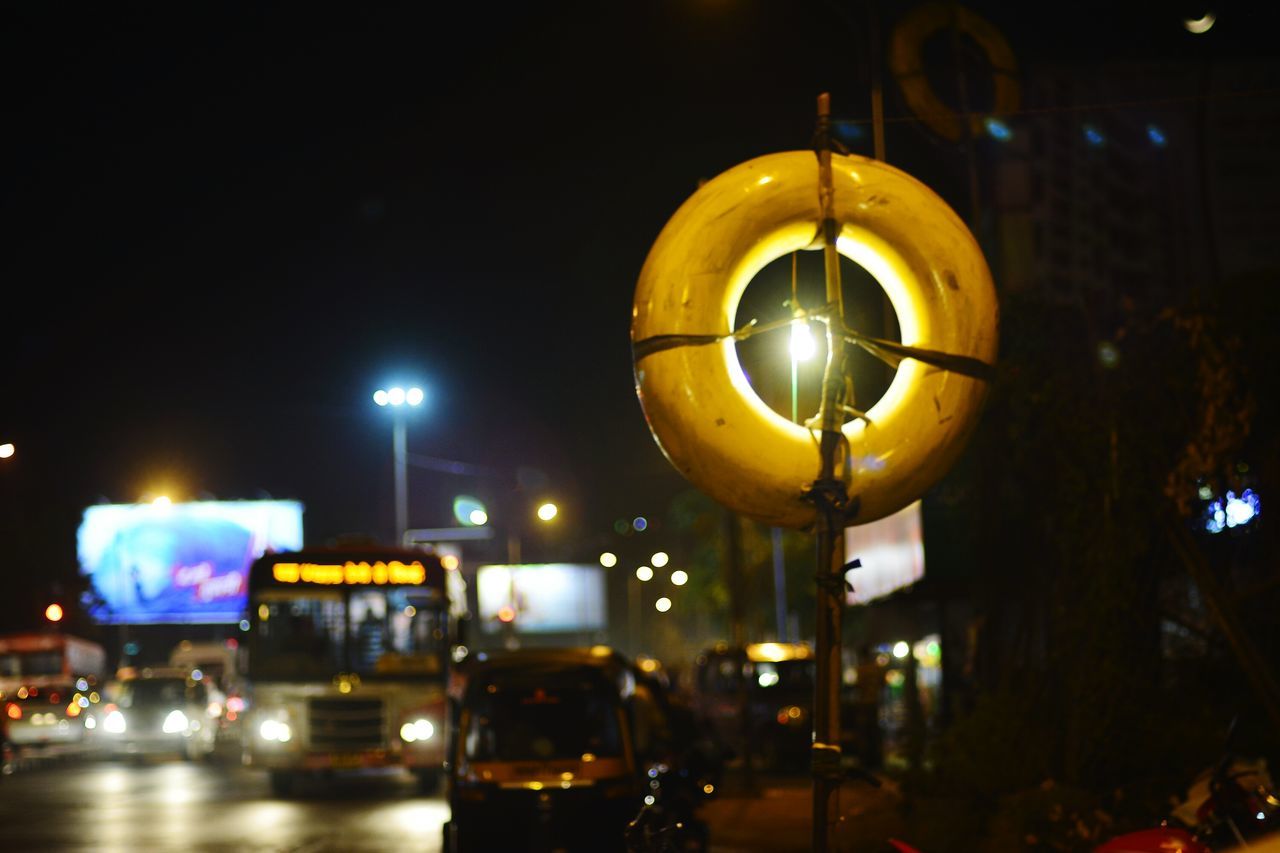 illuminated, night, lighting equipment, street light, electric light, transportation, yellow, electricity, street, light - natural phenomenon, glowing, lantern, light bulb, lit, low angle view, city, built structure, building exterior, architecture, no people