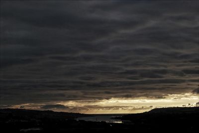 Scenic view of dramatic sky during sunset