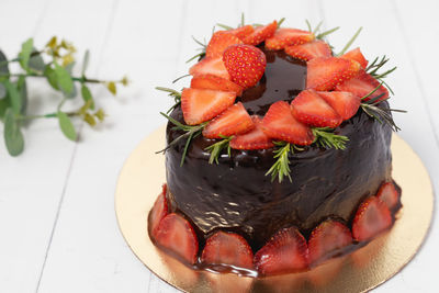 Close-up of strawberries in plate on table