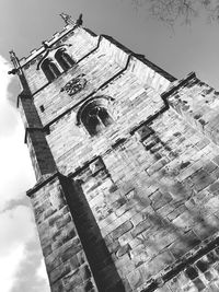 Low angle view of old building against sky