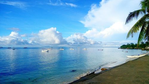 Panoramic view of sea against blue sky