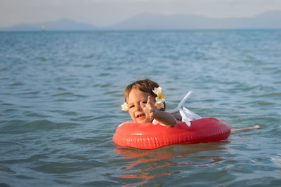 Girl swimming in sea