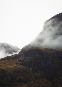 Scenic view of mountains against clear sky