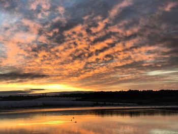 Scenic view of dramatic sky during sunset