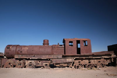 Old built structure against clear blue sky
