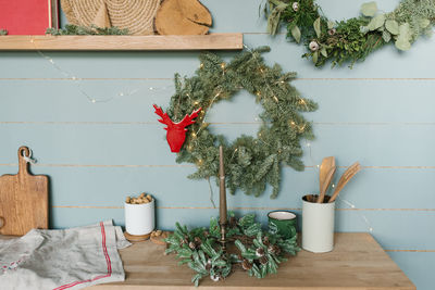 Close-up of the kitchen interior. christmas decoration. christmas flower wreath-hoop hanging