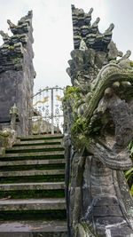 Low angle view of old temple against sky