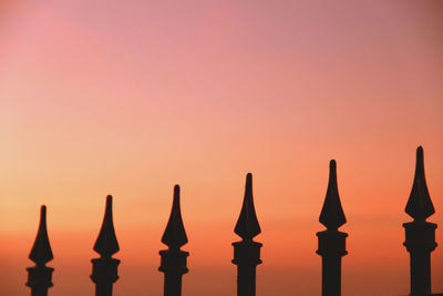 Close-up of silhouette against clear sky during sunset