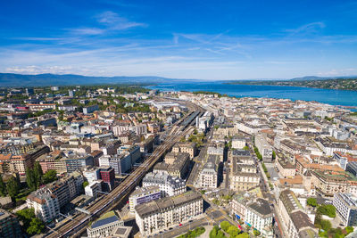 High angle view of buildings in city against sky