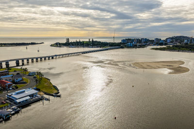 Panoramic view of beach against sky during sunset