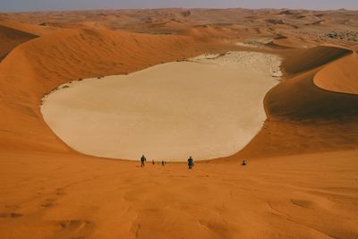 High angle view of pond amidst desert