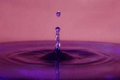 Close-up of water splashing on white background