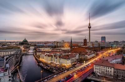 High angle view of city buildings during sunset