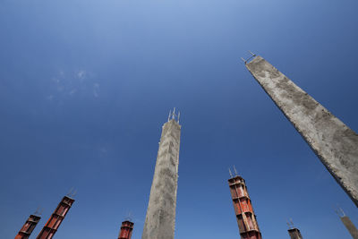 Low angle view of smoke stack against sky