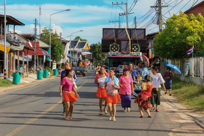 People on street in city