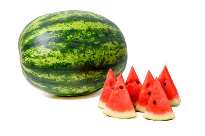 Close-up of fruits against white background