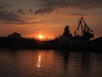 View of harbor at sunset