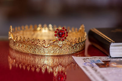 Close-up of red and decoration on table