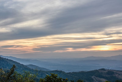 Scenic view of mountains against sky during sunset