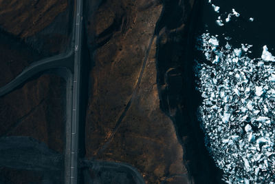 High angle view of road by lake