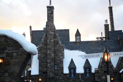 Buildings in city against sky