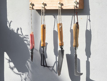 Close-up of clothes hanging on wall