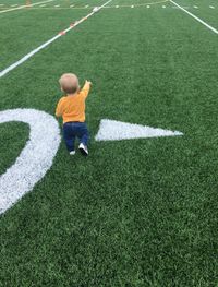 Child on football field