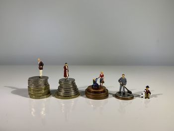 Group of people on table against white background