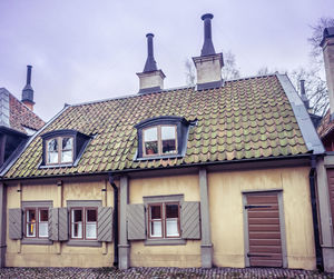 Low angle view of residential building against sky