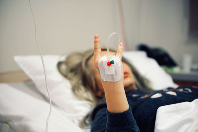 Close-up of hand of woman in hospital