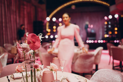 Woman sitting in restaurant