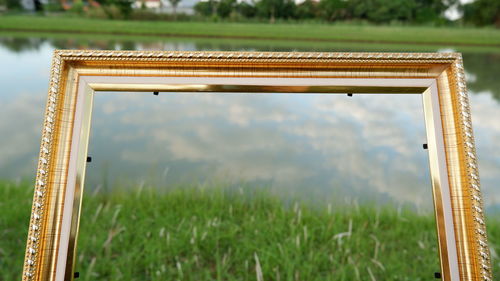 Close-up of metallic structure on field