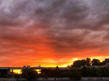 Scenic view of dramatic sky during sunset