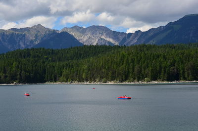 Scenic view of sea against mountains