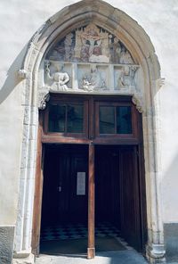 Low angle view of closed door of building