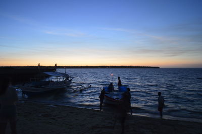 Scenic view of sea at sunset