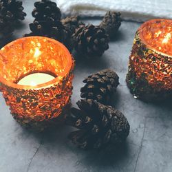 High angle view of illuminated pumpkin on table