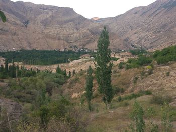 High angle view of landscape and mountains against sky