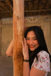 Portrait of a smiling young woman