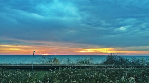 Scenic view of landscape at sunset