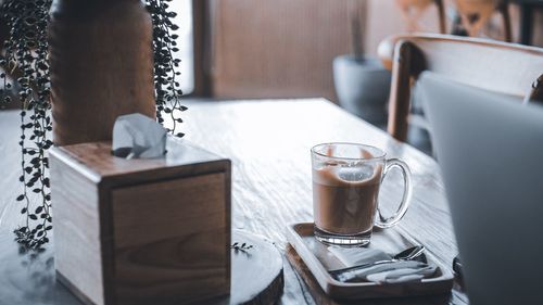 Close-up of coffee cup on table