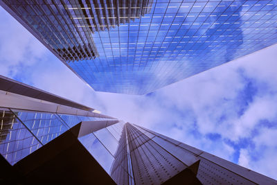 Low angle view of skyscraper against sky